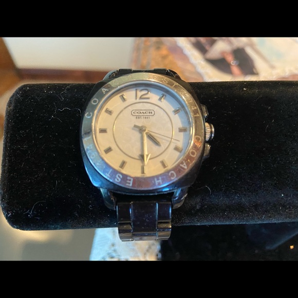 Really nice black coach watch.